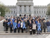 April 2, 2025: Senator Schwank joins PA Family Support Alliance and the Department of Human Services to plant flags in recognition of Child Abuse Prevention Month.